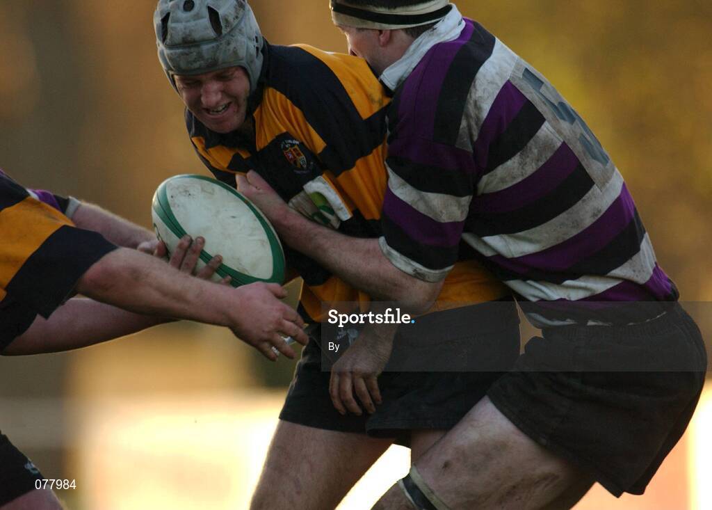 8 December 2001;  Billy Murphy, carlow, is tackled by Terenure's Dermot Quinn. AIB league Division 1, Terenure RFC v  Carlow FC, Lakelands Park, Terenure, Dublin. Rugby. Picture credit; Ray McManus / SPORTSFILE *EDI*