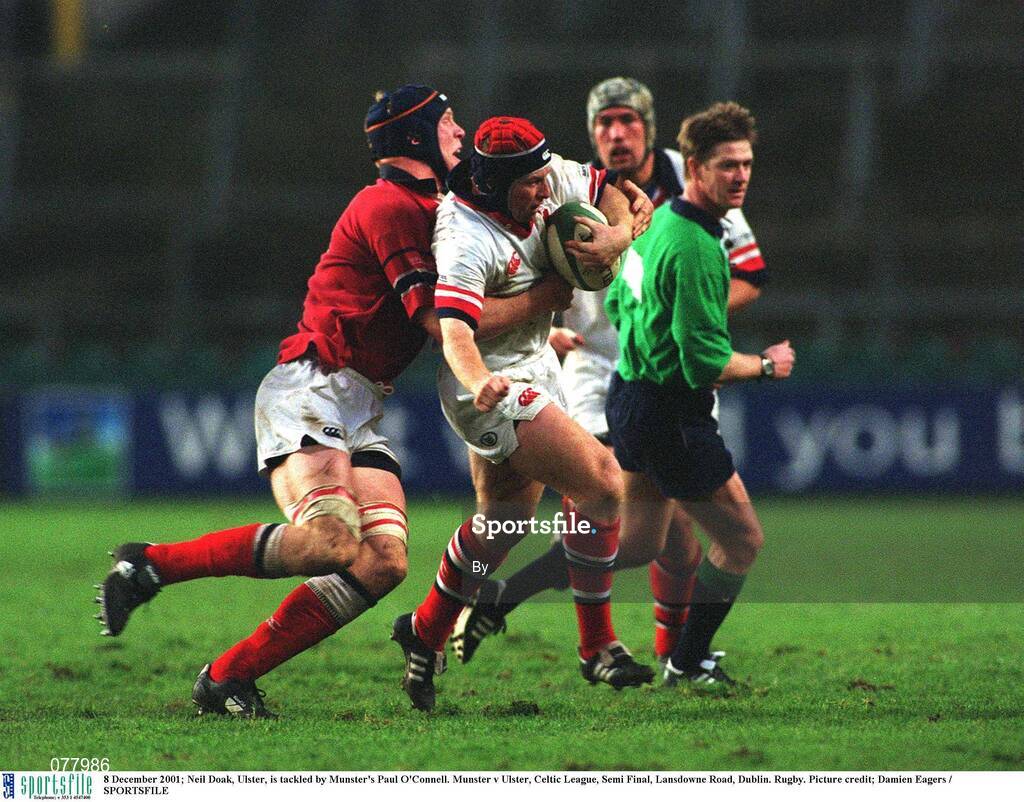 8 December 2001; Neil Doak, Ulster, is tackled by Munster's Paul O'Connell. Munster v Ulster, Celtic League, Semi Final, Lansdowne Road, Dublin. Rugby. Picture credit; Damien Eagers / SPORTSFILE