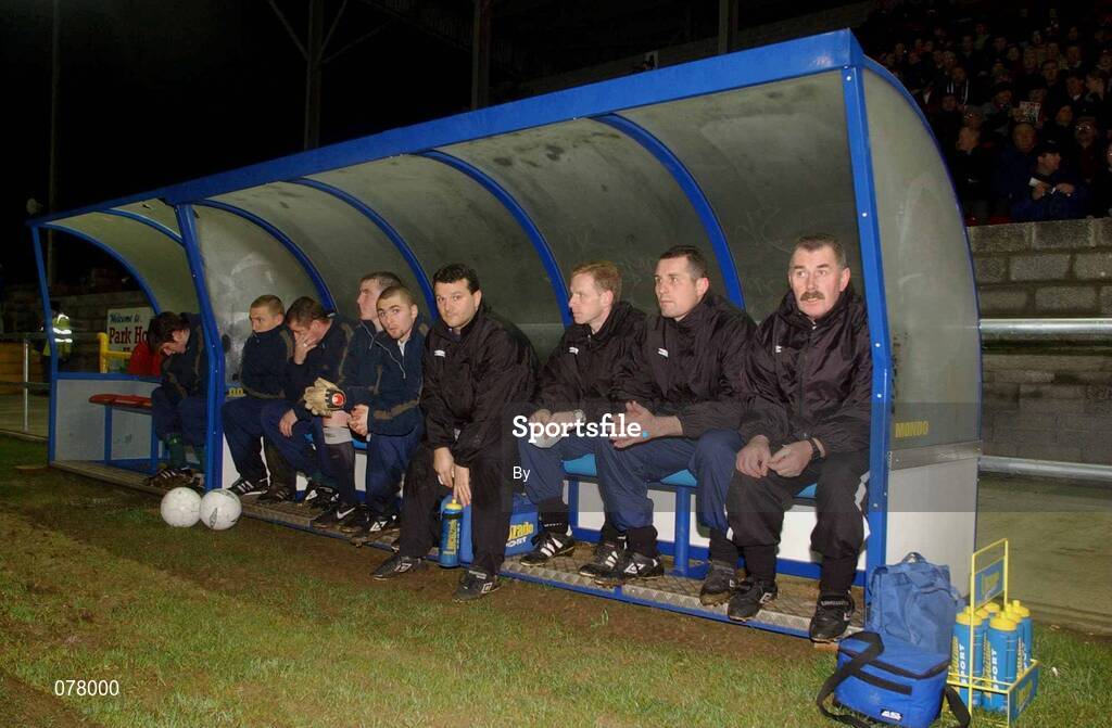 8 December 2001; Bohemians caretaker manager Liam O'Brien, second from right, players and technical staff watch from the dugout during the game.  eircom League Premier Division. Longford Town v Bohemians. Flancare Park, Longford. Soccer. Picture credit; David Maher / SPORTSFILE *EDI*
