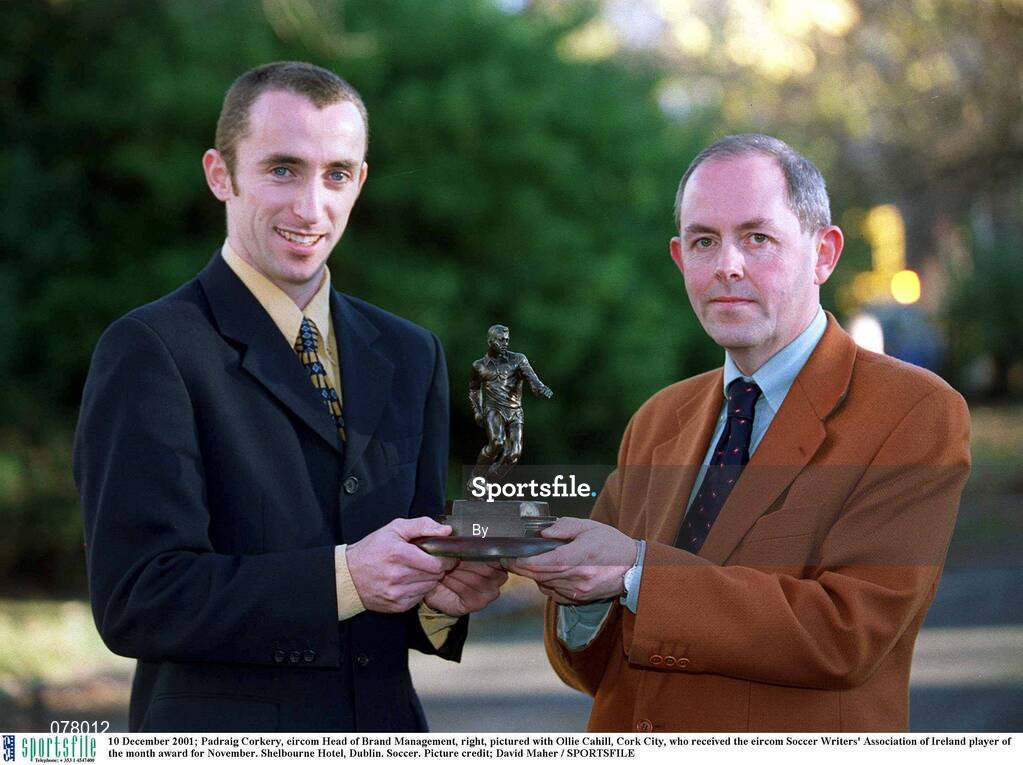 10 December 2001; Padraig Corkery, eircom Head of Brand Management, right, pictured with Ollie Cahill, Cork City, who received the eircom Soccer Writers' Association of Ireland player of the month award for November. Shelbourne Hotel, Dublin. Soccer. Picture credit; David Maher / SPORTSFILE