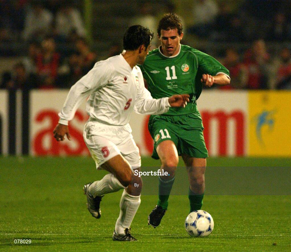 14 November 2001; Kevin Kilbane, Republic of Ireland, in action against Mohd Ali Peyrovani, Iran. Iran v Republic of Ireland, World Cup Play off 2nd leg, Azadi Stadium, Tehran, Iran. Soccer. Picture credit; Ray McManus / SPORTSFILE *EDI*