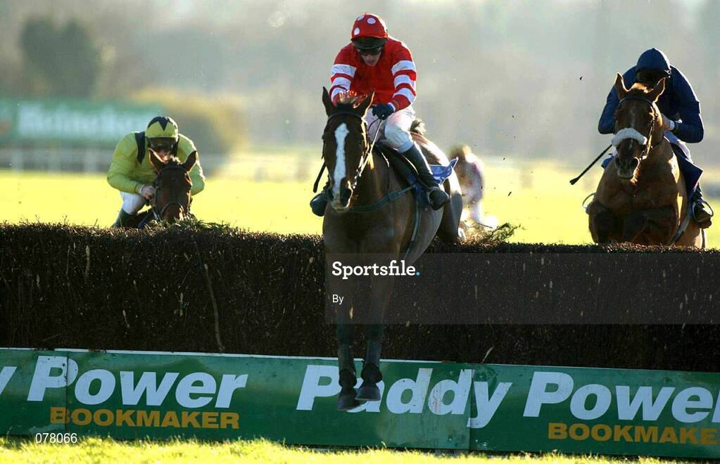 9 December 2001; Florida Pearl with Paul Carberry up jump the last, ahead of Native Upmanship, right, (Conor O'Dwyer),  on their way to win The John Durkan Memorial Punchestown Steeplechase of £70,000, Horse Racing, Punchestown Racecourse, Co. Kildare  Picture credit; Damien Eagers / SPORTSFILE *EDI*
