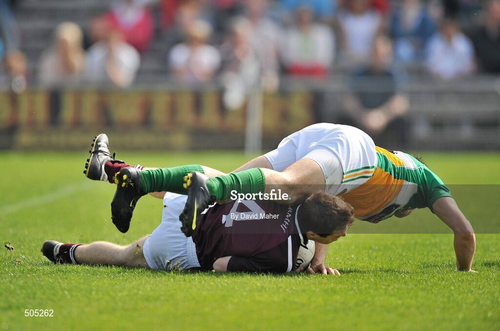 10 April 2011; John Gaffey, Westmeath, in action against John Reynolds, Offaly. Allianz Football League, Division 2, Round 7, Westmeath v Offaly, Cusack Park, Mullingar, Co. Westmeath. Picture credit: David Maher / SPORTSFILE