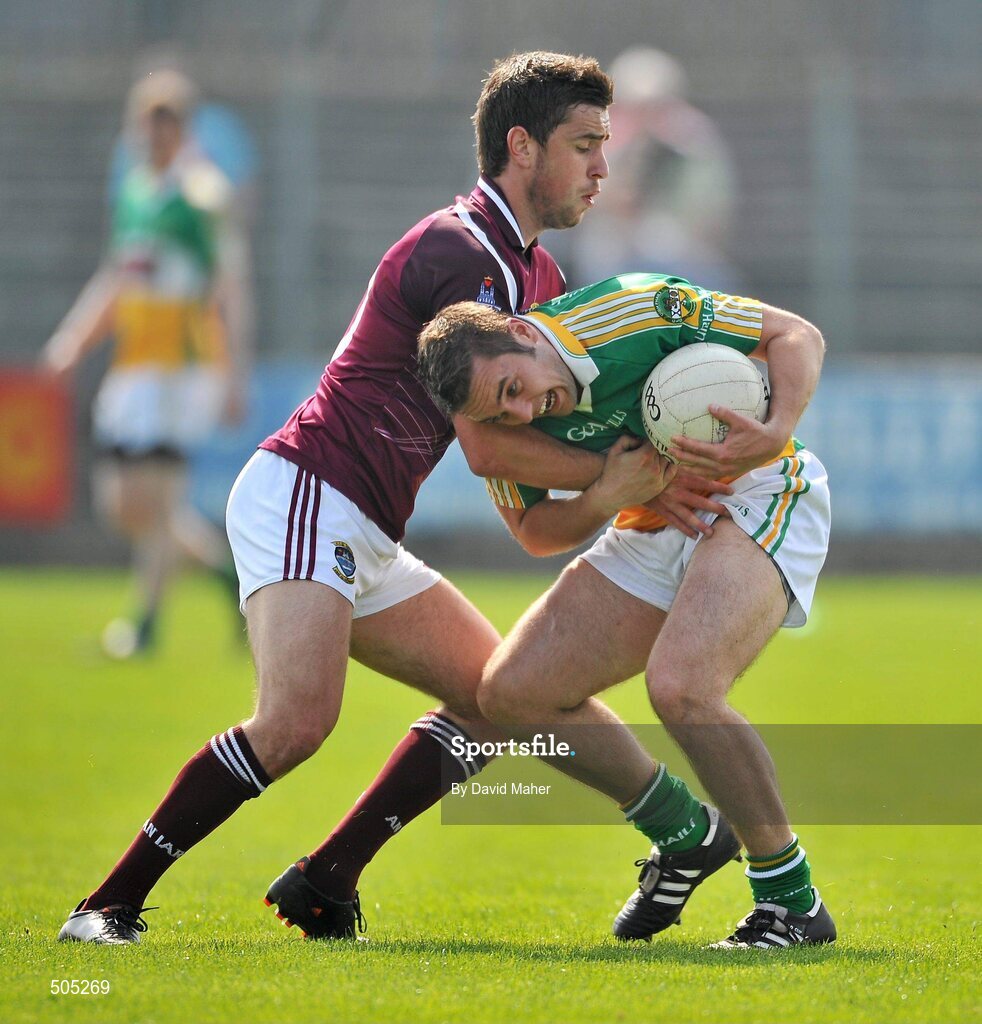 10 April 2011; James Keane, Offaly, in action against Paul Sharry, Westmeath. Allianz Football League, Division 2, Round 7, Westmeath v Offaly, Cusack Park, Mullingar, Co. Westmeath. Picture credit: David Maher / SPORTSFILE