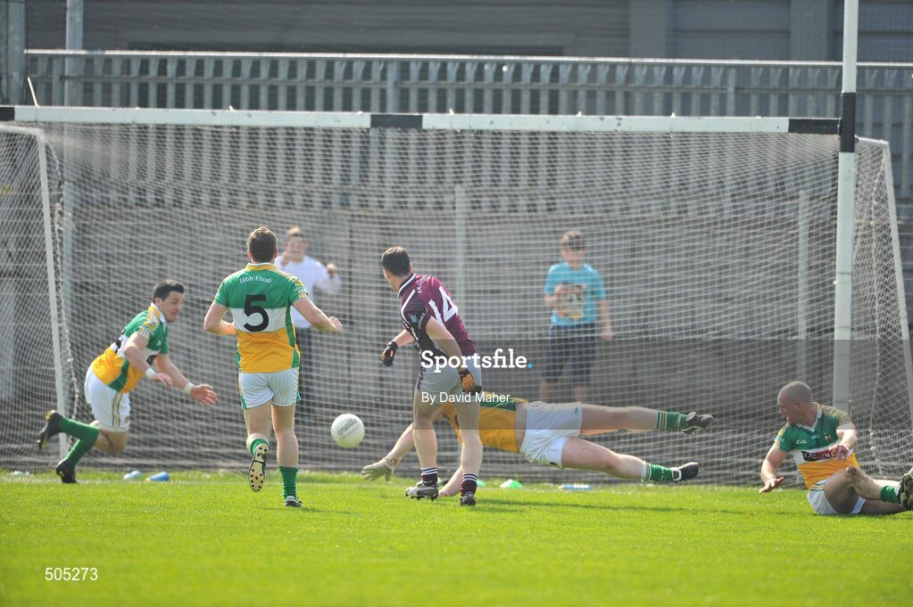 10 April 2011; Dessie Dolan, Westmeath, beats Offaly goalkeeper Alan Mulhall, only to have his shot saved on the line from John Reynolds, far left. Allianz Football League, Division 2, Round 7, Westmeath v Offaly, Cusack Park, Mullingar, Co. Westmeath. Picture credit: David Maher / SPORTSFILE