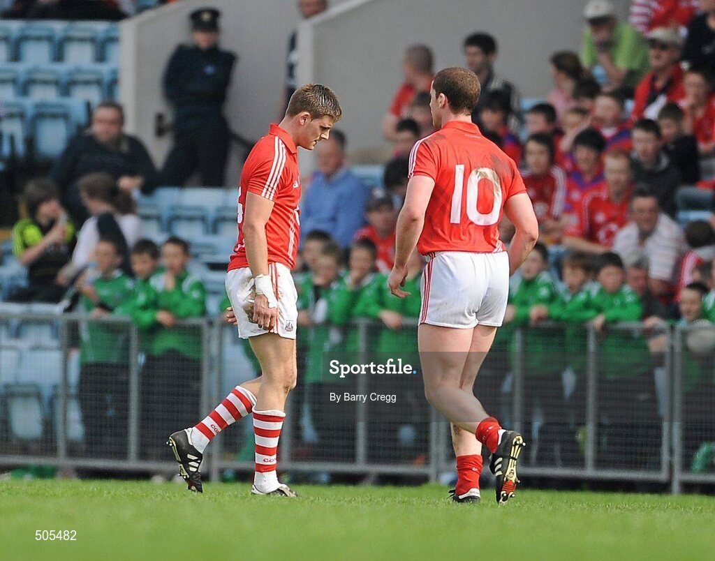 10 April 2011; Eoin Cadogan, Cork, walks off the field past team-mate Fintan Goold, right, after being shown a red card. Allianz Football League, Division 1, Round 7, Cork v Armagh, Pairc Ui Chaoimh, Cork. Picture credit: Barry Cregg / SPORTSFILE