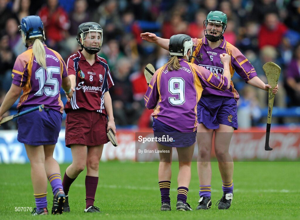 17 April 2011; Wexford's Noeleen Lambert, right, and Kate Kelly celebrate at the final whistle as their team-mate Katrina Parrock shakes hands with Galway's Emer Haverty. Irish Daily Star Camogie League, Division 1, Final, Galway v Wexford, Semple Stadium, Thurles, Co. Tipperary. Picture credit: Brian Lawless / SPORTSFILE