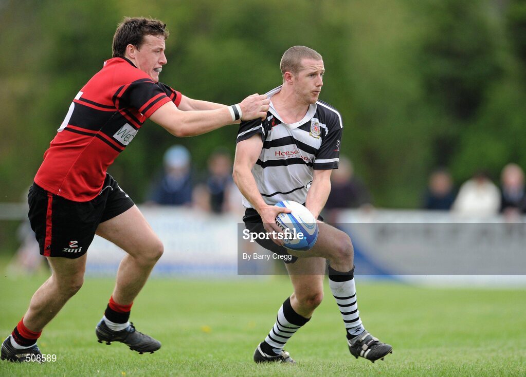 24 April 2011; Stephen McGee, Dundalk RFC, is tackled by Mick Brazil, Tullamore RFC. Newstalk Provincial Towns Cup Final, Dundalk RFC v Tullamore RFC, Edenderry RFC, Coolavacoose, Carbury, Co. Kildare. Picture credit: Barry Cregg / SPORTSFILE