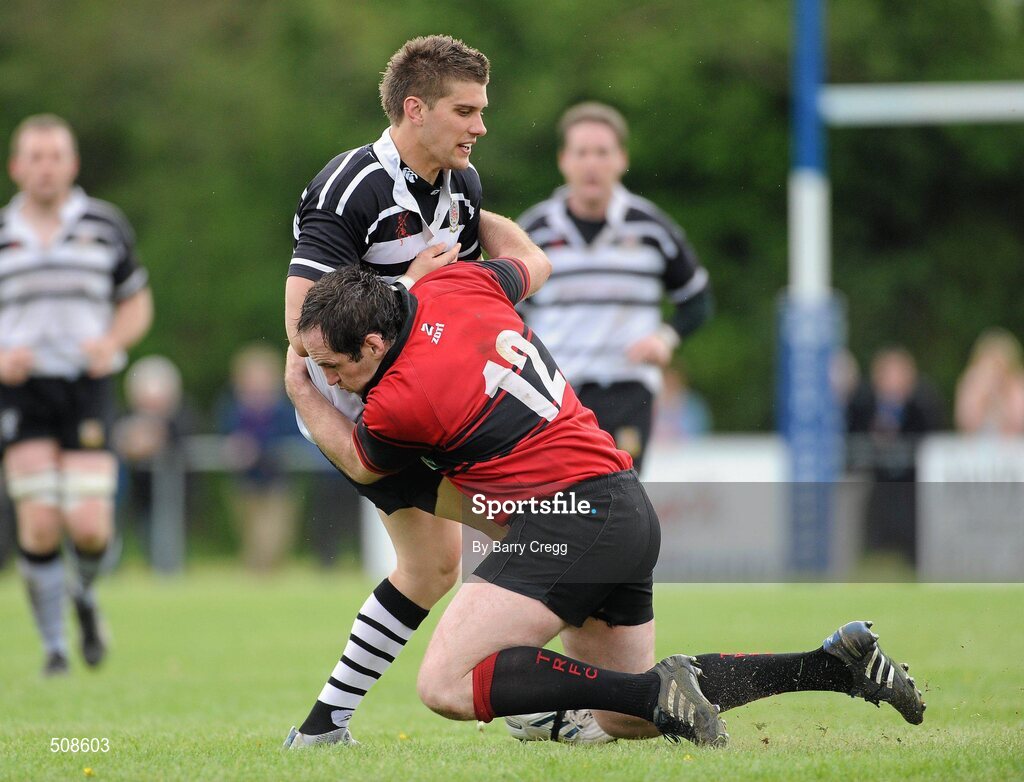 24 April 2011; John Dodd, Dundalk RFC, is tackled by Ivor Scully, Tullamore RFC. Newstalk Provincial Towns Cup Final, Dundalk RFC v Tullamore RFC, Edenderry RFC, Coolavacoose, Carbury, Co. Kildare. Picture credit: Barry Cregg / SPORTSFILE