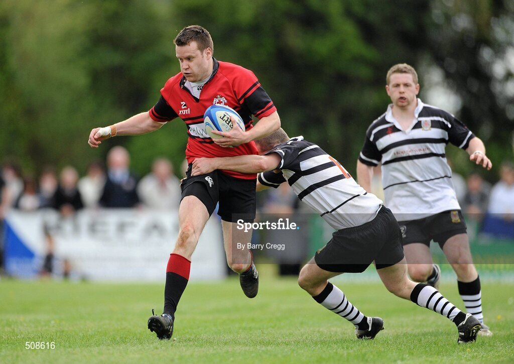 24 April 2011; Colin Hughes, Tullamore RFC, is tackled by Steven McGee, Dundalk RFC. Newstalk Provincial Towns Cup Final, Dundalk RFC v Tullamore RFC, Edenderry RFC, Coolavacoose, Carbury, Co. Kildare. Picture credit: Barry Cregg / SPORTSFILE
