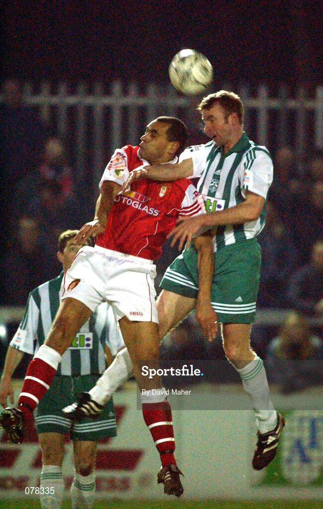 14 December 2001; Paul Osam of St Patrick's Athletic in action against Mick Doohan of Bray Wanderers during the FAI Carlsberg Cup Second Round match between St Patrick's Athletic and Bray Wanderers at Richmond Park in Dublin. Photo by David Maher/Sportsfile