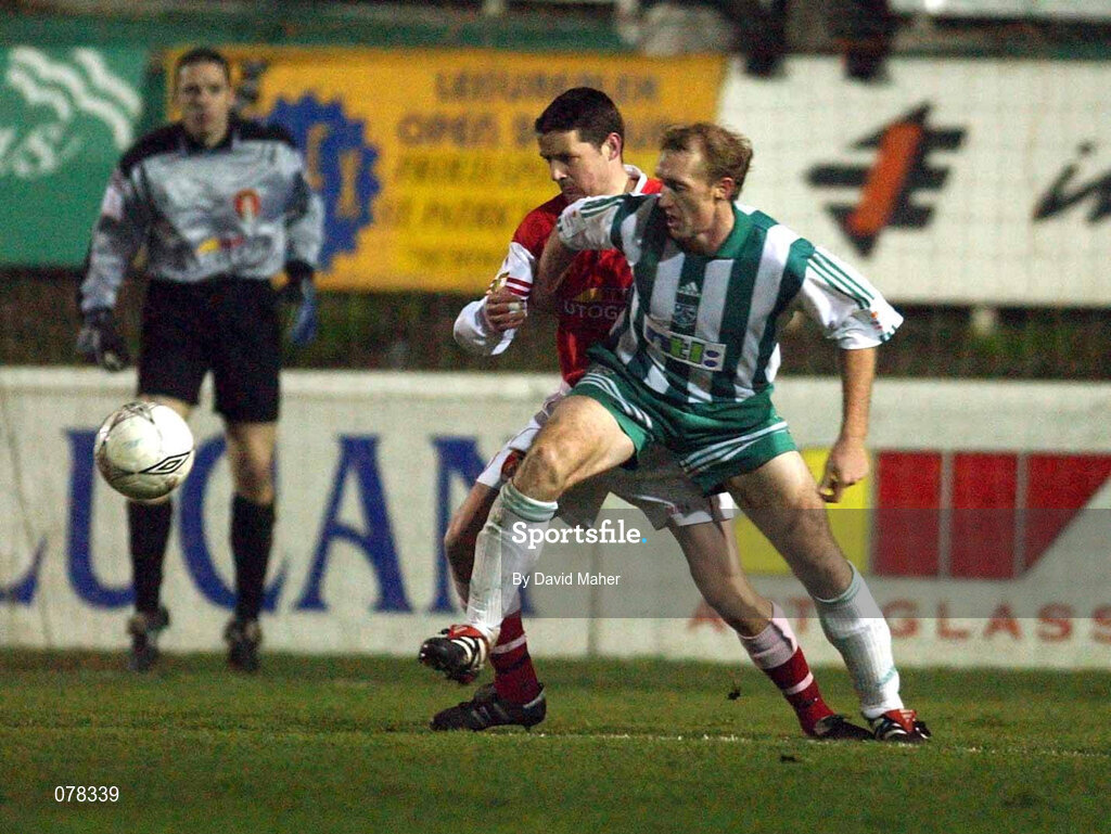 14 December 2001; Willie Burke of St Patrick's Athletic in action against Paul Keegan of Bray Wanderers during the FAI Carlsberg Cup Second Round match between St Patrick's Athletic and Bray Wanderers at Richmond Park in Dublin. Photo by David Maher/Sportsfile