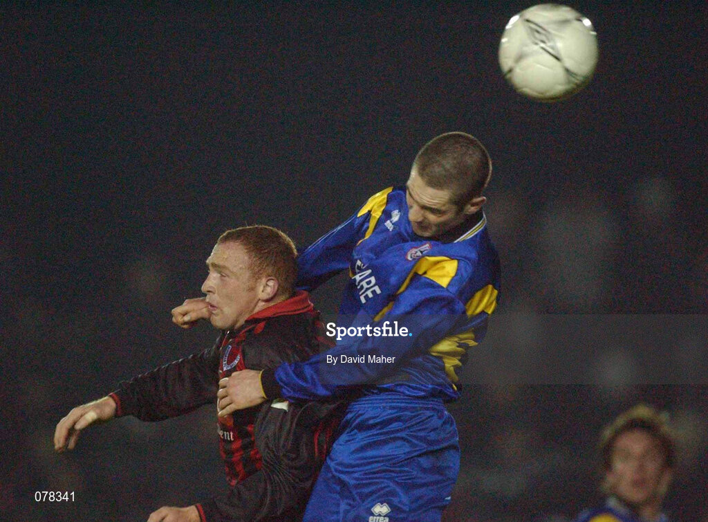 15 December 2001; Paul McNally of Longford Town in action against Glen Crowe of Bohemians during the FAI Carlsberg Cup Second Round match between Longford Town and Bohemians at Flancare Park in Longford. Photo by David Maher/Sportsfile
