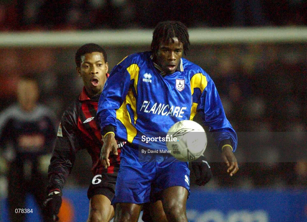 15 December 2001; Eric Lavine of Longford Town in action against Avery John of Bohemians during the FAI Carlsberg Cup Second Round match between Longford Town and Bohemians at Flancare Park in Longford. Photo by David Maher/Sportsfile