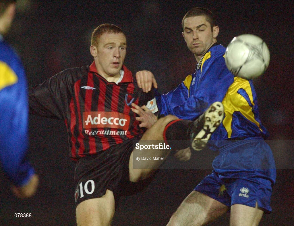 15 December 2001; Paul McNally of Longford Town in action against Glen Crowe of Bohemians during the FAI Carlsberg Cup Second Round match between Longford Town and Bohemians at Flancare Park in Longford. Photo by David Maher/Sportsfile