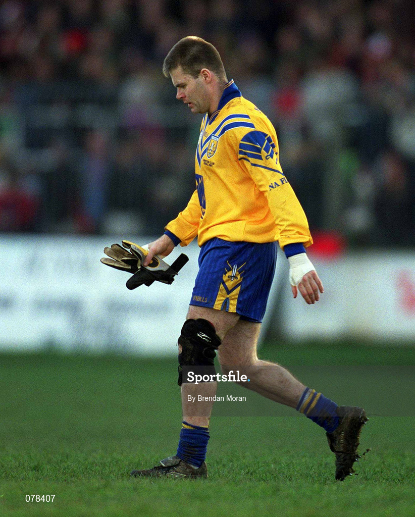 16 December 2001; Dessie Farrell of Na Fianna leaves the field after being sent off by referee Mick Monahan during the AIB Leinster Senior Club Football Championship Final match between Na Fianna and Rathnew at St Conleth's Park in Newbridge, Kildare. Photo by Brendan Moran/Sportsfile