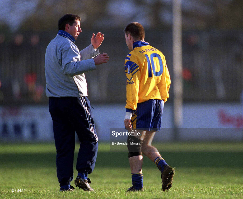 16 December 2001; Dessie Farrell of Fianna is met by team manager Mick Galvin as he leaves the field after he was sent off during the AIB Leinster Senior Club Football Championship Final match between Na Fianna and Rathnew at St Conleth's Park in Newbridge, Kildare. Photo by Brendan Moran/Sportsfile