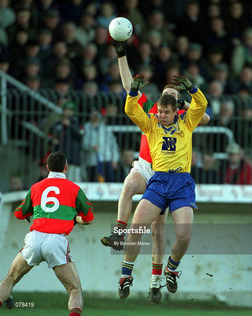 16 December 2001; Des Macken of Na Fianna contests a high ball with Darren Coffey of Rathnew during the AIB Leinster Senior Club Football Championship Final match between Na Fianna and Rathnew at St Conleth's Park in Newbridge, Kildare. Photo by Brendan Moran/Sportsfile