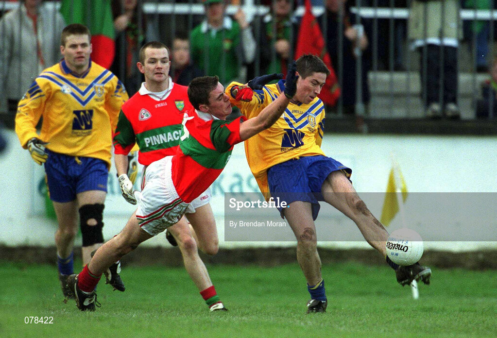 16 December 2001; Ian Foley of Na Fianna in action against Damian Power of Rathnew during the AIB Leinster Senior Club Football Championship Final match between Na Fianna and Rathnew at St Conleth's Park in Newbridge, Kildare. Photo by Brendan Moran/Sportsfile