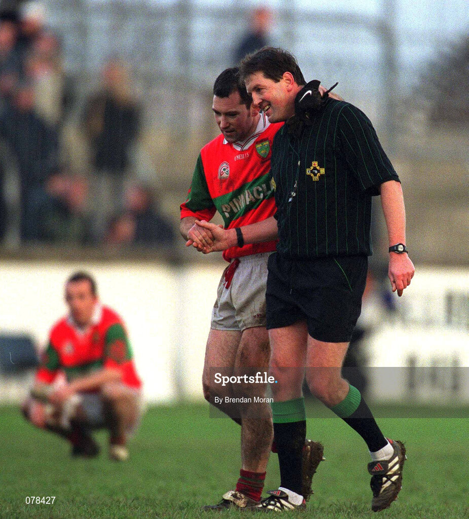 16 December 2001; Rathnew captain Trevor Doyle shakes hands with referee Mick Monahan after the drawn AIB Leinster Senior Club Football Championship Final match between Na Fianna and Rathnew at St Conleth's Park in Newbridge, Kildare. Photo by Brendan Moran/Sportsfile