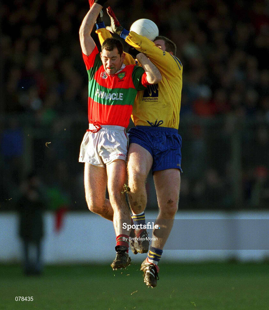 16 December 2001; Des Macken of Na Fianna in action against Trevor Doyle of Rathnew during the AIB Leinster Senior Club Football Championship Final match between Na Fianna and Rathnew at St Conleth's Park in Newbridge, Kildare. Photo by Brendan Moran/Sportsfile