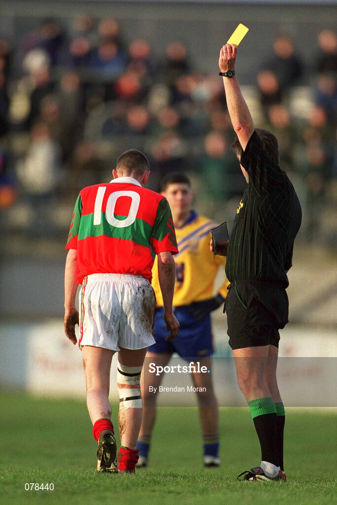 16 December 2001; Richard Dignam Rathnew is issued with a yellow card by referee Mick Monahan during the AIB Leinster Senior Club Football Championship Final match between Na Fianna and Rathnew at St Conleth's Park in Newbridge, Kildare. Photo by Brendan Moran/Sportsfile