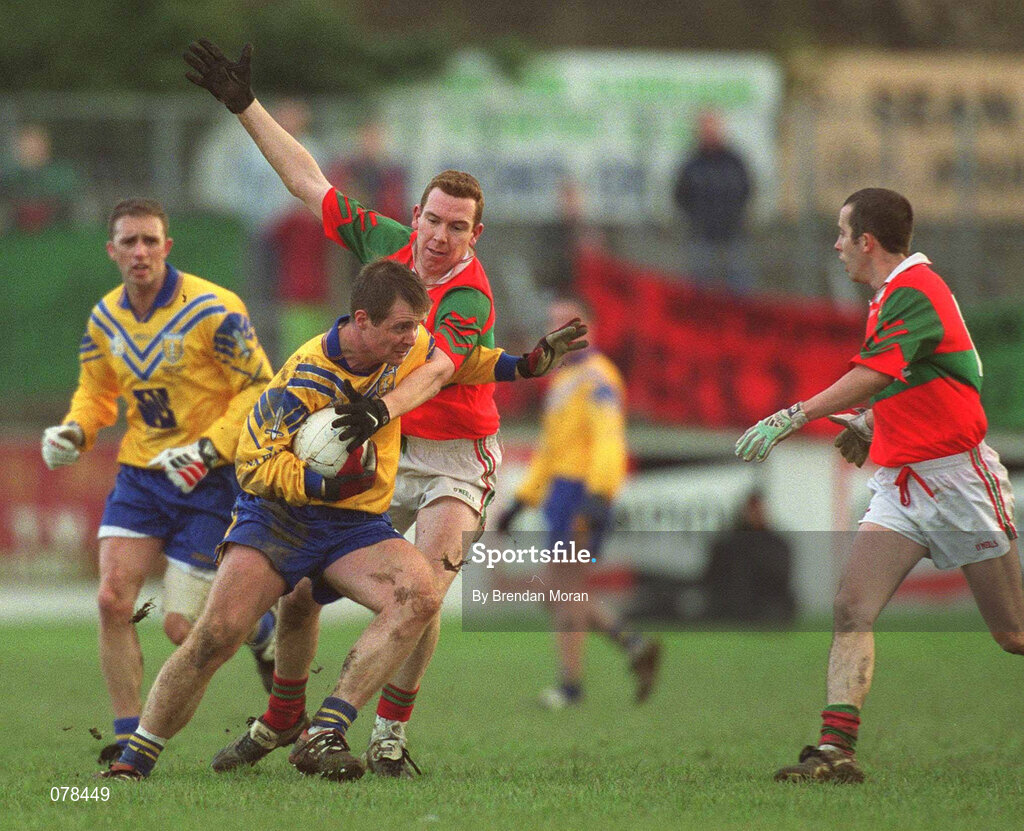 16 December 2001; Des Macken of Na Fianna in action against Darren Coffey of Rathnew during the AIB Leinster Senior Club Football Championship Final match between Na Fianna and Rathnew at St Conleth's Park in Newbridge, Kildare. Photo by Brendan Moran/Sportsfile