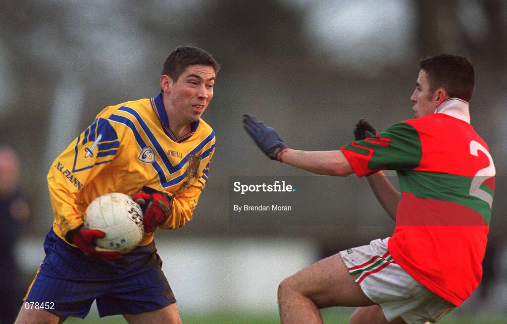 16 December 2001; Ian Foley of Na Fianna in action against Barry Mernagh of Rathnew during the AIB Leinster Senior Club Football Championship Final match between Na Fianna and Rathnew at St Conleth's Park in Newbridge, Kildare. Photo by Brendan Moran/Sportsfile