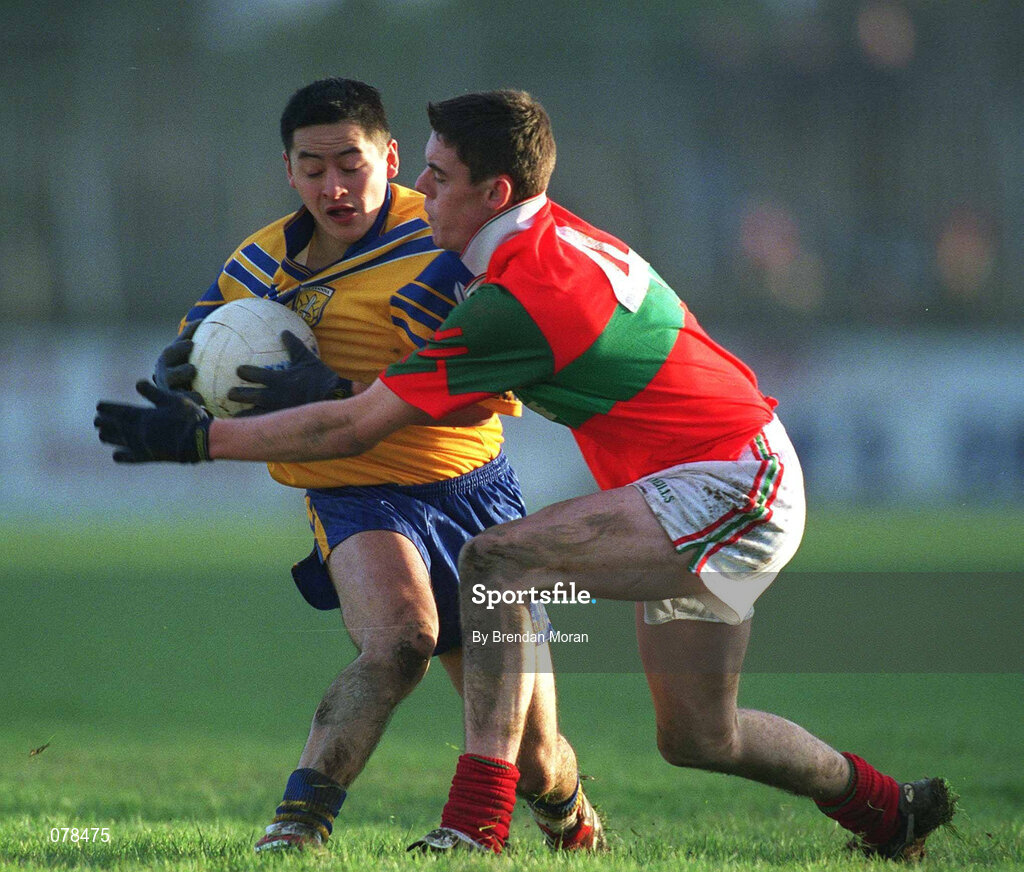 16 December 2001; Jason Sherlock of Na Fianna in action against Damian Power of Rathnew during the AIB Leinster Senior Club Football Championship Final match between Na Fianna and Rathnew at St Conleth's Park in Newbridge, Kildare. Photo by Brendan Moran/Sportsfile