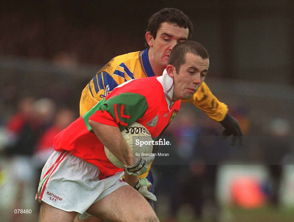 16 December 2001; Anthony Mernagh of Rathnew in action against Mark Foley of Na Fianna during the AIB Leinster Senior Club Football Championship Final match between Na Fianna and Rathnew at St Conleth's Park in Newbridge, Kildare. Photo by Brendan Moran/Sportsfile