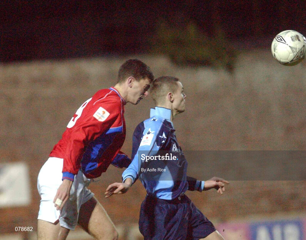 23 December 2001; Robert Martin of UCD in action against Kevin Doherty of Shelbourne during the eircom League Premier Division match between UCD and Shelbourne at Belfield Park in Dublin. Photo by  Aoife Rice/Sportsfile