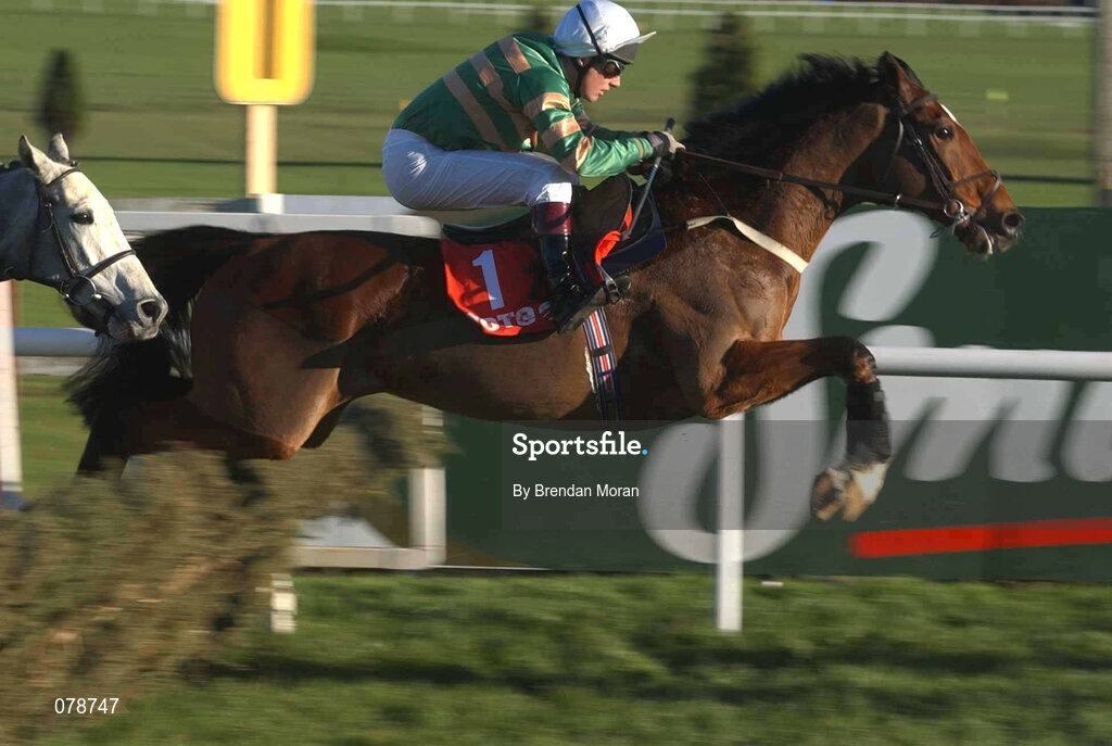 29 December 2001; Istabraq, with Charlie Swan up,  jumps the last, first time round, on their way to winning the Tote December Festival Hurdle on Day Four of the Leopardstown Christmas Festival at Leopardstown Racecourse in Dublin. Photo by Brendan Moran/Sportsfile