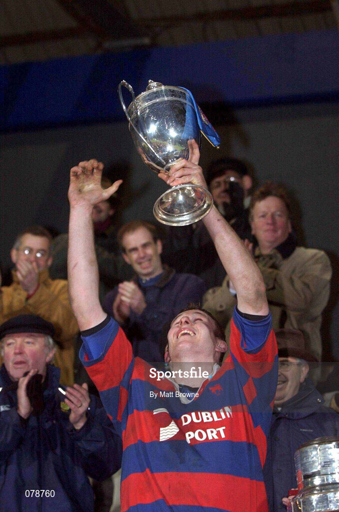 29 December 2001; Clontarf captain Donal Sheehan lifts the cup following the Leinster Senior Cup Final match between Clontarf and County Carlow at Donnybrook Stadium in Dublin. Photo by Matt Browne/Sportsfile