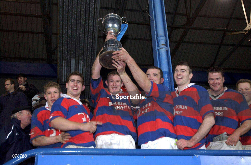 29 December 2001; Clontarf captain Donal Sheehan lifts the cup with team-mates following the Leinster Senior Cup Final match between Clontarf and County Carlow at Donnybrook Stadium in Dublin. Photo by Matt Browne/Sportsfile