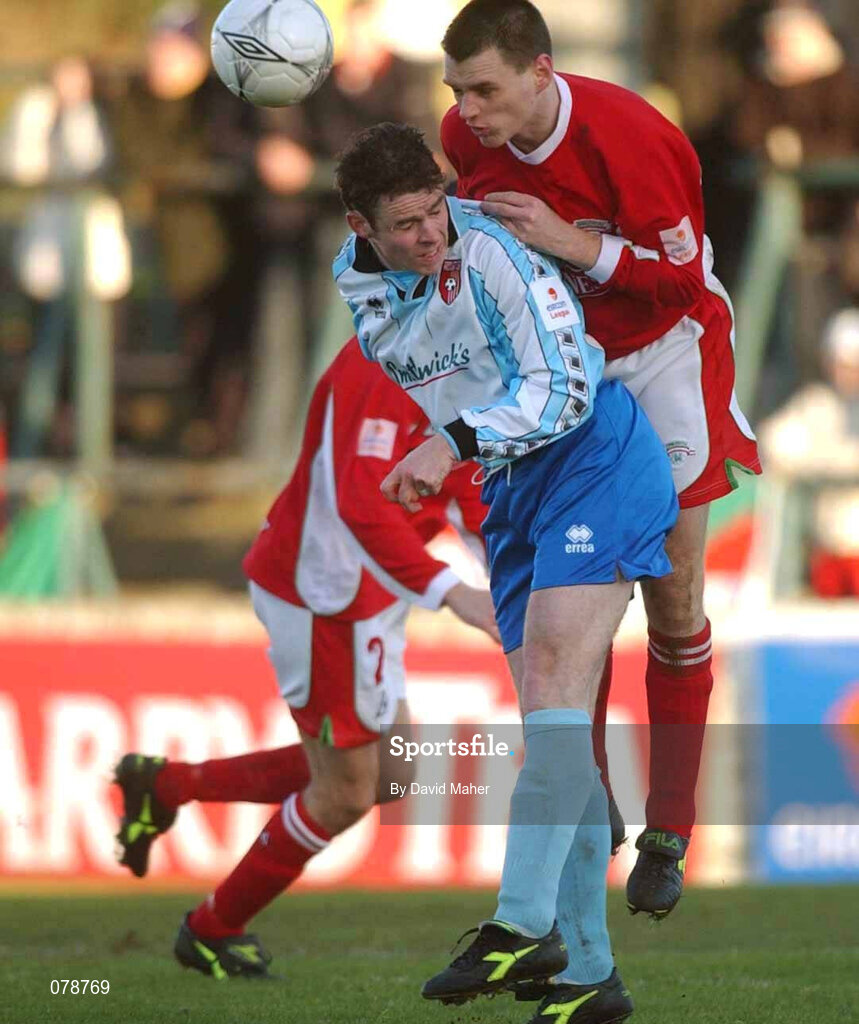 30 December 2001; Padraig Moran of Derry City in action against Stephen Napier of Cork City during the eircom League Premier Division match between Cork City and Derry City at Turners Cross in Dublin. Photo by David Maher/Sportsfile