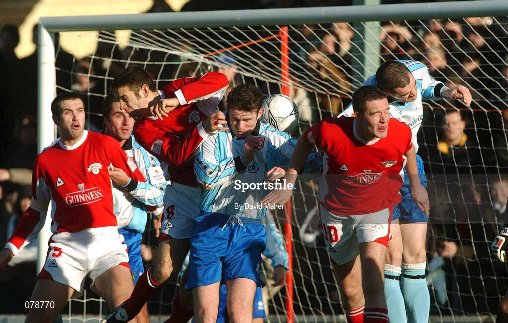 30 December 2001; Padraig Moran and Sean Hargan of Derry City in action against Derek Coughlan, Neil Horgan and Noel Hartigan of Cork City during the eircom League Premier Division match between Cork City and Derry City at Turners Cross in Dublin. Photo by David Maher/Sportsfile