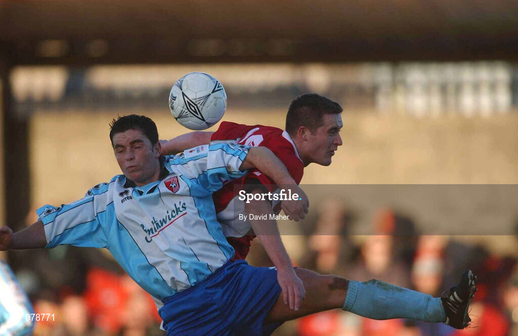 30 December 2001; Eddie McCallion of Derry City in action against Noel Hartigan of Cork City during the eircom League Premier Division match between Cork City and Derry City at Turners Cross in Dublin. Photo by David Maher/Sportsfile