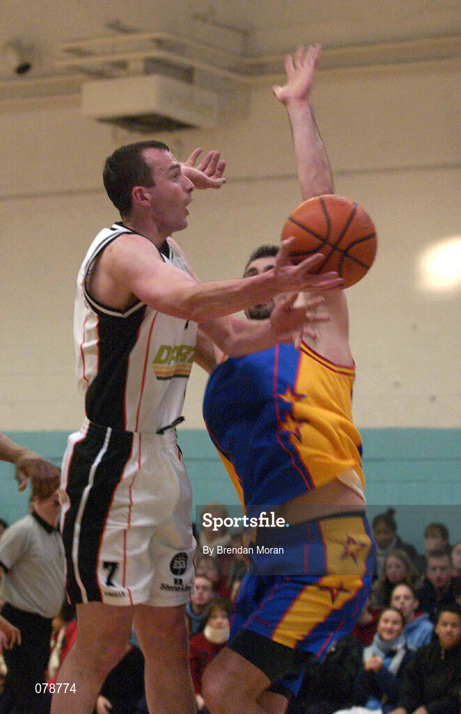 30 December 2001; Damien Sealy of Killester in action against Mike Trimmer of St Vincent's during the ESB Men's Superleague Basketball match between St Vincent's and Dart Killester at St Vincent's Basketball Club in Dublin. Photo by Brendan Moran/Sportsfile