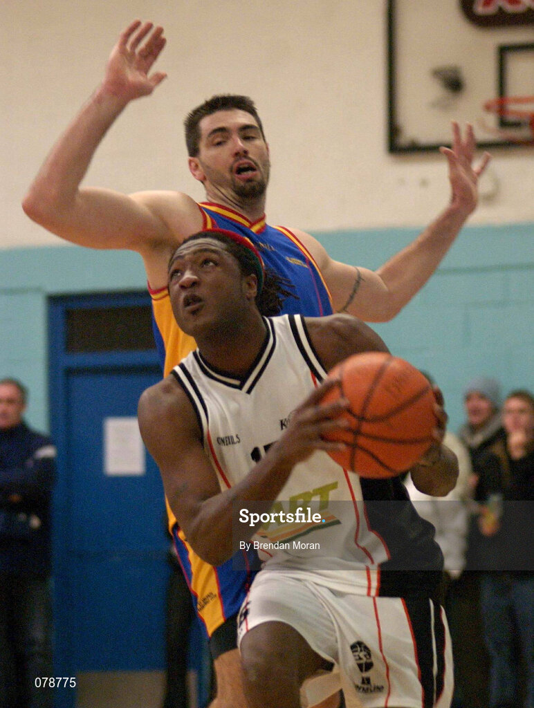 30 December 2001; Chris Davis of Killester in action against Mike Trimmer of St Vincent's during the ESB Men's Superleague Basketball match between St Vincent's and Dart Killester at St Vincent's Basketball Club in Dublin. Photo by Brendan Moran/Sportsfile