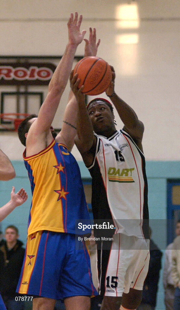 30 December 2001; Chris Davis of  Killester in action against Mike Trimmer of St Vincent's during the ESB Men's Superleague Basketball match between St Vincent's and Dart Killester at St Vincent's Basketball Club in Dublin. Photo by Brendan Moran/Sportsfile