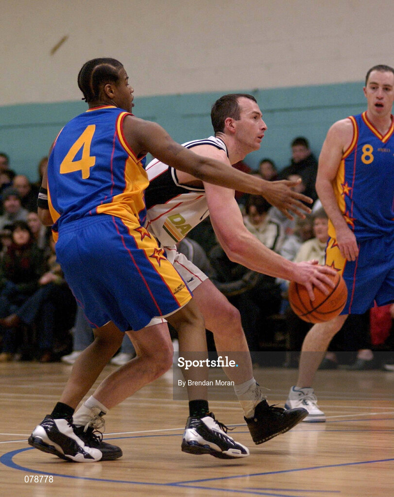 30 December 2001; Damien Sealy of Killester in action against Corey Dickerson of St Vincent's during the ESB Men's Superleague Basketball match between St Vincent's and Dart Killester at St Vincent's Basketball Club in Dublin. Photo by Brendan Moran/Sportsfile