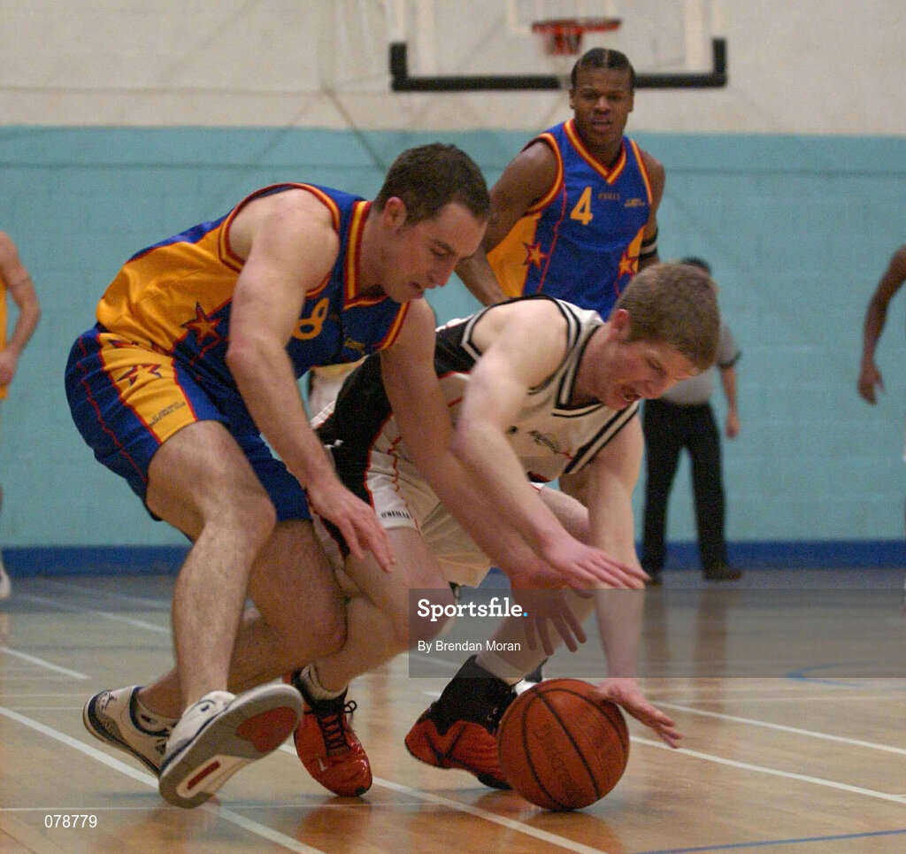 30 December 2001; Jonathan Grennell of Killester in action against David Donnelly of St Vincent's during the ESB Men's Superleague Basketball match between St Vincent's and Dart Killester at St Vincent's Basketball Club in Dublin. Photo by Brendan Moran/Sportsfile