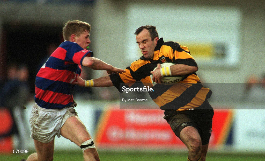 29 December 2001; Ian Dwyer of County Carlow in action against Daire Higgins of Clontarf during the Leinster Senior Cup Final match between Clontarf and County Carlow at Donnybrook Stadium in Dublin. Photo by Matt Browne/Sportsfile