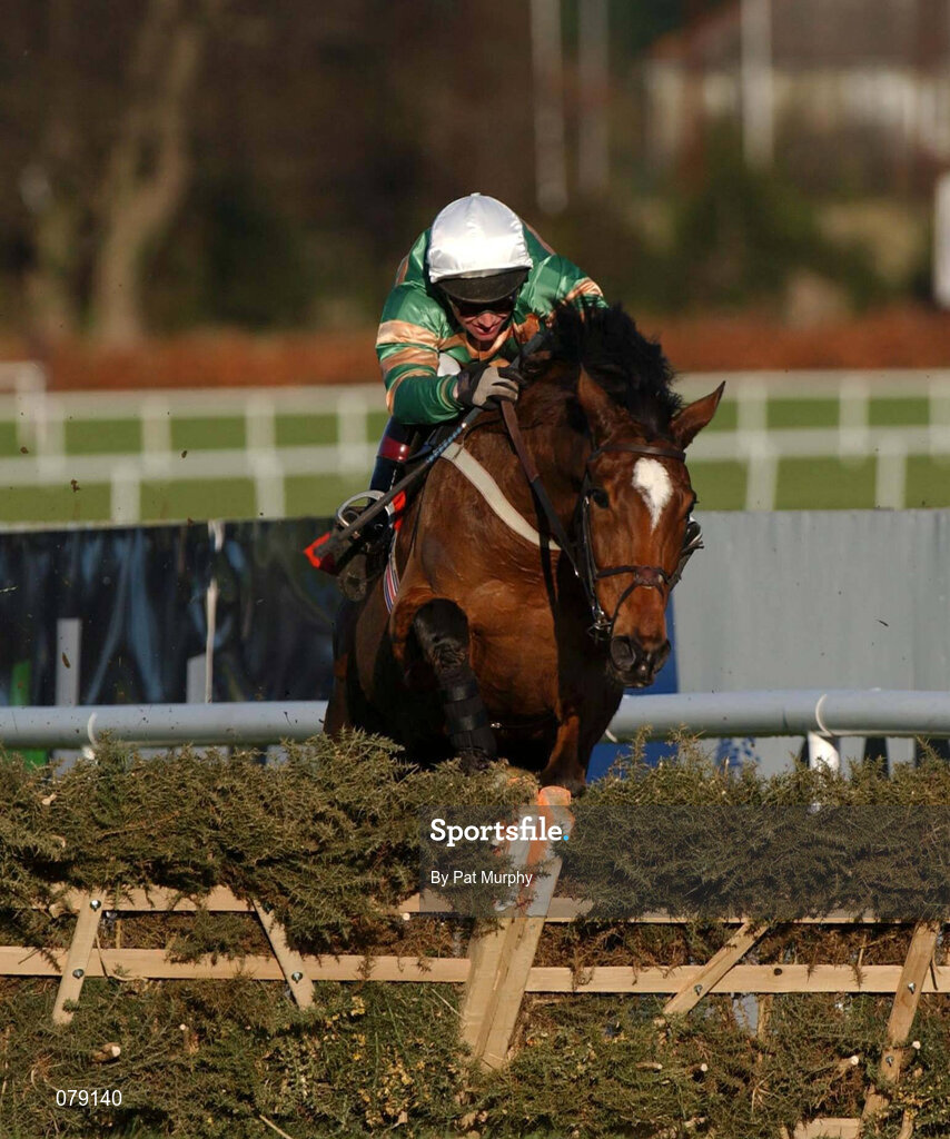 29 December 2001; Istabraq, with Charlie Swan up, jumps the last on their way to winning the Tote December Festival Hurdle on Day Four of the Leopardstown Christmas Festival at Leopardstown Racecourse in Dublin. Photo by Pat Murphy/Sportsfile