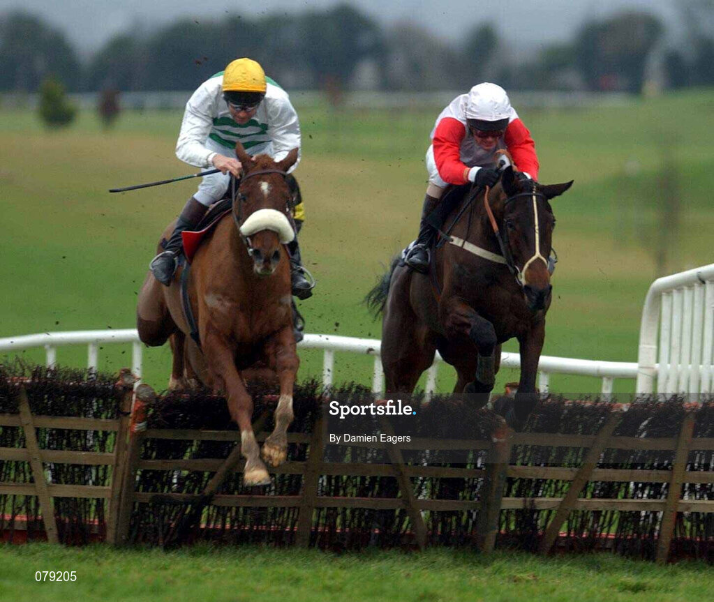 12 January 2002; Eskimo Jack, with Conor O'Dwyer up, left, jump the last ahead of The Young Bishop, with Kieran Kelly up, on their to winning The Mullacurry Maiden Hurdle at Navan Racecourse in Meath. Photo by Damien Eagers/Sportsfile