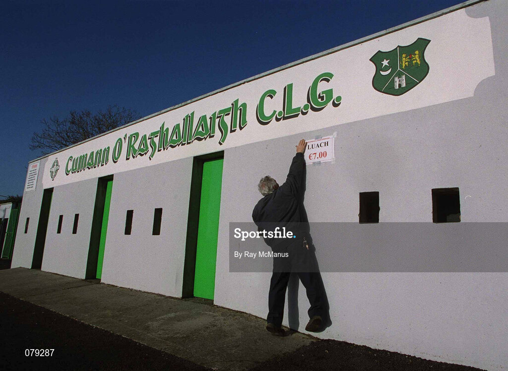 13 January 2002; Benny Markey, the O'Raghallaighs GAA club representitive on the Louth County Board affixes the addmission price sign outside the County grounds prior to the O'Byrne Cup Semi-Final match between Louth and Wicklow at O'Raghallaighs GAA Club in Drogheda, Louth. Photo by Ray McManus/Sportsfile