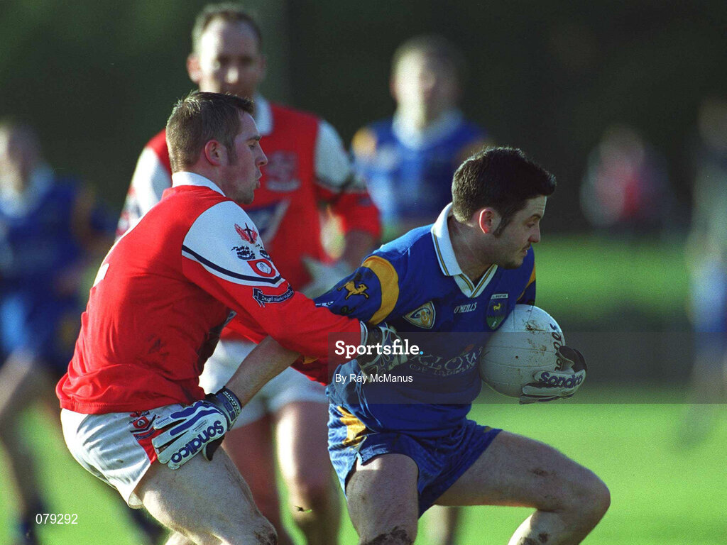 13 January 2002; Jonathan Behan of Wicklow in action against Alan Page of Louth during the O'Byrne Cup Semi-Final match between Louth and Wicklow at O'Raghallaighs GAA Club in Drogheda, Louth. Photo by Ray McManus/Sportsfile