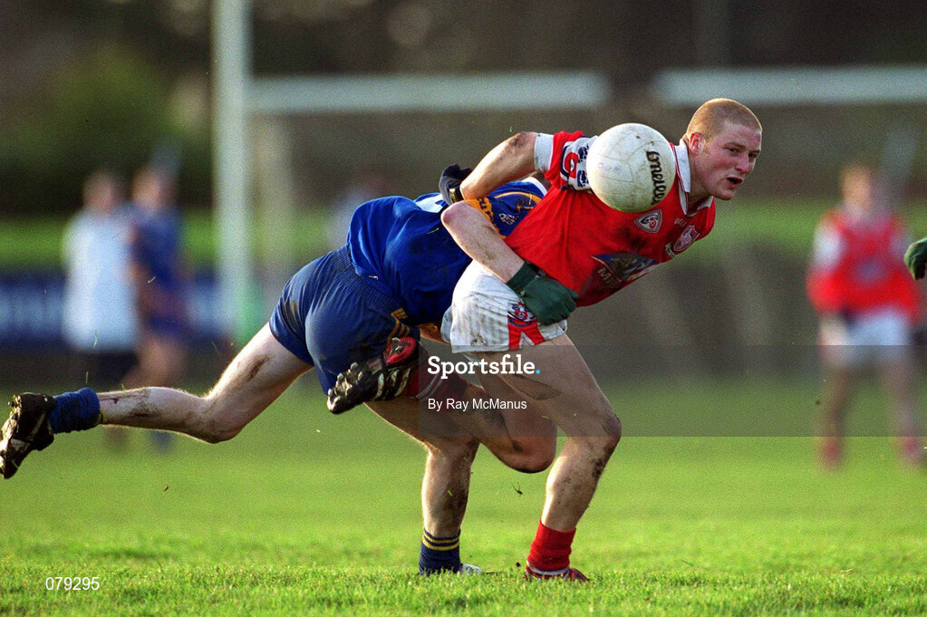 13 January 2002; JP Rooney of Louth in action against Stephen Cush of Wicklow during the O'Byrne Cup Semi-Final match between Louth and Wicklow at O'Raghallaighs GAA Club in Drogheda, Louth. Photo by Ray McManus/Sportsfile