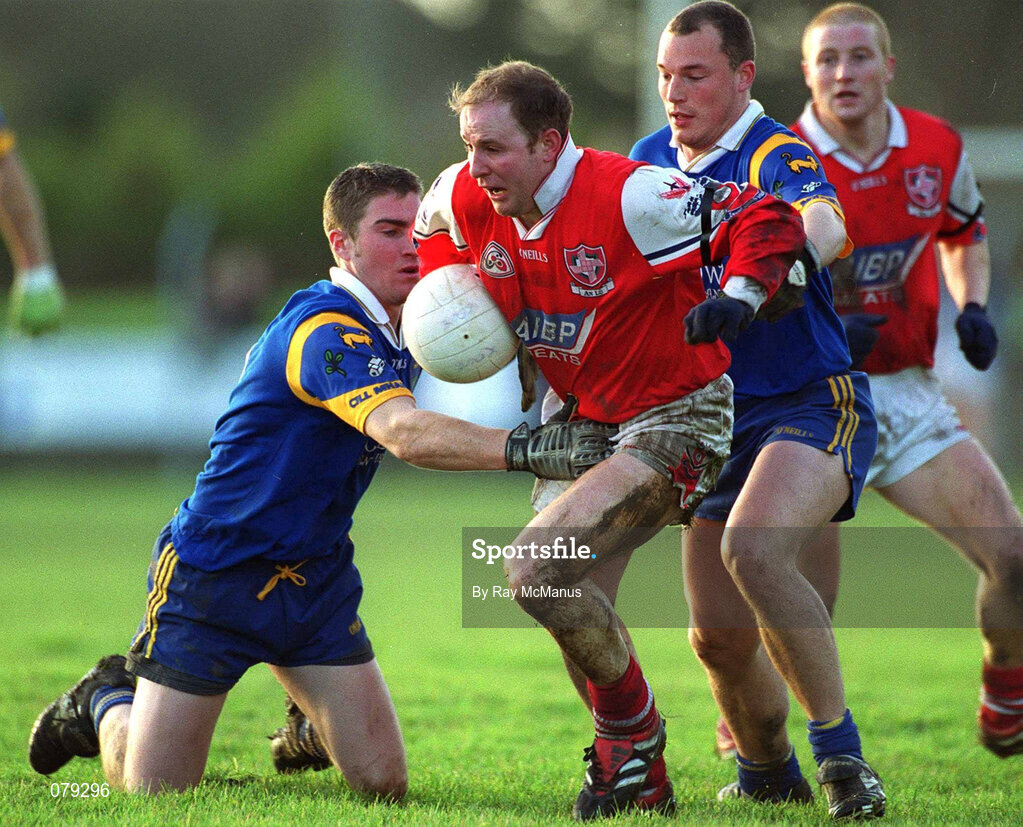13 January 2002; Colin Kelly of Louth in action against Colm Toomey and Brendan Daly of Wicklow during the O'Byrne Cup Semi-Final match between Louth and Wicklow at O'Raghallaighs GAA Club in Drogheda, Louth. Photo by Ray McManus/Sportsfile