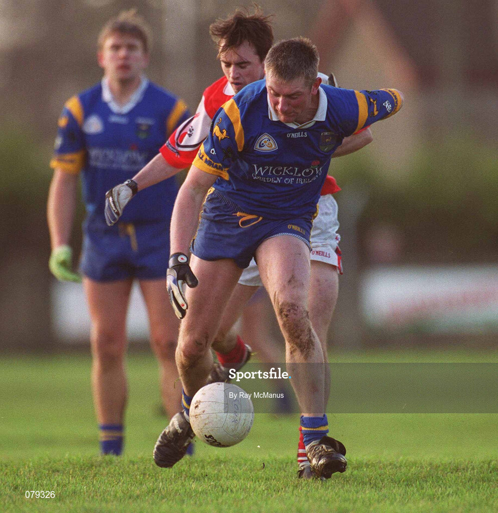 13 January 2002; Shane O'Neill of Wicklow in action against Simon Gerard of Louth during the O'Byrne Cup Semi-Final match between Louth and Wicklow at O'Raghallaighs GAA Club in Drogheda, Louth. Photo by Ray McManus/Sportsfile